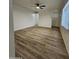 Living room, wood-look floors, and ceiling fan at 2611 N 40Th Ave, Phoenix, AZ 85009