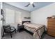 Cozy bedroom featuring neutral tones, plush carpeting, and a comfortable twin bed at 3115 E Turnberry Dr, Gilbert, AZ 85298