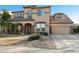 Charming two-story home featuring a tile roof, desert landscaping, and a two-car garage at 3115 E Turnberry Dr, Gilbert, AZ 85298