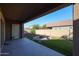 Covered patio and fire pit with artificial turf at 3134 E Sunrise Pl, Chandler, AZ 85286