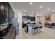 Modern kitchen with dark cabinetry, granite countertops, and island at 3134 E Sunrise Pl, Chandler, AZ 85286