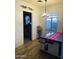 Bright dining room features a table with bench seating and a view into the kitchen at 3215 W Garfield St, Phoenix, AZ 85009