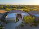 Aerial view of a luxurious home with a stunning golf course view at 33448 N 69Th Pl, Scottsdale, AZ 85266