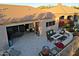 Landscaped backyard patio with fire pit at 33448 N 69Th Pl, Scottsdale, AZ 85266