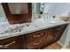 Vanity with granite countertop and dark wood cabinets at 33448 N 69Th Pl, Scottsdale, AZ 85266