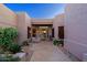 Inviting courtyard with seating area and beautiful landscaping at 33448 N 69Th Pl, Scottsdale, AZ 85266