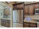 Stainless steel appliances and granite countertops in kitchen at 33448 N 69Th Pl, Scottsdale, AZ 85266