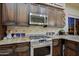 Kitchen with stainless steel appliances and granite countertops at 33448 N 69Th Pl, Scottsdale, AZ 85266