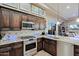 Kitchen features stainless steel appliances and granite countertops at 33448 N 69Th Pl, Scottsdale, AZ 85266