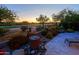 Landscaped patio garden with fountain and golf course view at 33448 N 69Th Pl, Scottsdale, AZ 85266