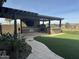 Outdoor kitchen and seating area with pergola at 3374 E Virgil Dr, Gilbert, AZ 85298