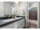 Elegant bathroom with a double sink vanity and a tub-shower combo at 3374 E Virgil Dr, Gilbert, AZ 85298