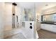 Modern bathroom featuring a step-in shower with dual shower heads and a glass partition at 3374 E Virgil Dr, Gilbert, AZ 85298