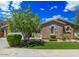 Craftsman style home with stone accents and a manicured lawn at 3374 E Virgil Dr, Gilbert, AZ 85298