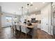 Bright kitchen featuring an oversized island with seating, stainless steel appliances, and great natural lighting at 3374 E Virgil Dr, Gilbert, AZ 85298