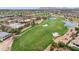 Aerial view showing golf course, pool, and clubhouse at 3471 E Powell Way, Gilbert, AZ 85298