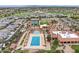 Aerial view of community pool, clubhouse, and golf course at 3471 E Powell Way, Gilbert, AZ 85298