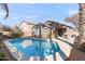 Inviting backyard pool and patio area, perfect for outdoor relaxation and entertaining at 3471 E Powell Way, Gilbert, AZ 85298