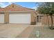 Attractive exterior of a condo with a two-car garage and well-maintained landscaping at 3510 E Hampton Ave # 3, Mesa, AZ 85204