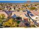 Aerial view of home showcasing backyard patio, solar panels and mountain views at 3543 W Magellan Dr, Anthem, AZ 85086