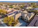 Aerial view of house with solar panels and surrounding neighborhood at 3543 W Magellan Dr, Anthem, AZ 85086