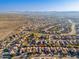 Aerial view showcasing the home and surrounding neighborhood in a desert setting at 3543 W Magellan Dr, Anthem, AZ 85086