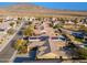 Aerial view showing home with solar panels, pool, and mountain views at 3543 W Magellan Dr, Anthem, AZ 85086