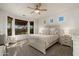 Relaxing bedroom with large windows and ample natural light at 3543 W Magellan Dr, Anthem, AZ 85086