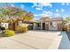 House with a two-car garage and desert landscaping at 3543 W Magellan Dr, Anthem, AZ 85086