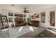 Bright and airy living room with comfortable seating and natural light at 3543 W Magellan Dr, Anthem, AZ 85086