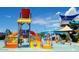 Colorful water playground with slides and splash features at 3543 W Magellan Dr, Anthem, AZ 85086