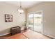 Bright dining area with sliding door leading to a backyard and pool at 3640 W Melinda Ln, Glendale, AZ 85308