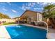 Inviting backyard oasis featuring a sparkling pool and basketball court at 3640 W Melinda Ln, Glendale, AZ 85308