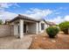 Covered patio with block wall and gravel landscaping at 3645 E Sheffield Rd, Gilbert, AZ 85296