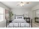 Serene bedroom featuring a comfy bed and a modern lamp at 3645 E Sheffield Rd, Gilbert, AZ 85296