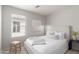 Well-lit bedroom with a plush bed and window at 3645 E Sheffield Rd, Gilbert, AZ 85296