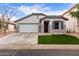 Single-story home with attached garage and landscaped lawn at 3645 E Sheffield Rd, Gilbert, AZ 85296