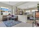 Bright living room with adjacent breakfast nook and view to the tv/Gathering room at 40325 N Graham Way, Anthem, AZ 85086