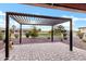 Relaxing patio with pergola and view of the lake at 41929 W Springtime Rd, Maricopa, AZ 85138