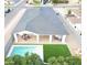 An aerial view of a private backyard oasis with a pool, covered patio, and manicured turf at 4201 N 18Th Pl, Phoenix, AZ 85016