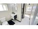 Modern bathroom featuring a floating vanity, sleek fixtures, and access to the main bedroom at 4201 N 18Th Pl, Phoenix, AZ 85016