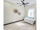 Bright bedroom featuring a ceiling fan, decorative accents, and warm natural light at 4201 N 18Th Pl, Phoenix, AZ 85016