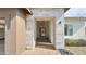 Stunning front entryway features a light brick surround and views of the lush landscaping at 4201 N 18Th Pl, Phoenix, AZ 85016