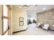 Bright and airy foyer featuring brick accent wall and an open floor plan at 4201 N 18Th Pl, Phoenix, AZ 85016