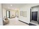 Bright foyer area with light-colored flooring, neutral walls, and stylish decor, providing an inviting entrance to the home at 4201 N 18Th Pl, Phoenix, AZ 85016