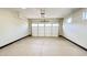 Spacious garage with epoxy flooring and a white paneled garage door at 4201 N 18Th Pl, Phoenix, AZ 85016