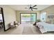 Beautiful main bedroom with light wood floors and doors that open to the pool and patio at 4201 N 18Th Pl, Phoenix, AZ 85016