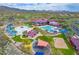 Aerial view of community pool, water park, and playground at 42424 N Gavilan Peak Pkwy # 47102, Anthem, AZ 85086