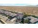 Aerial view showcasing a large house and surrounding desert landscape at 44020 N 50Th Ln, New River, AZ 85087