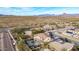 Aerial view showing house, neighborhood, and mountain views at 44020 N 50Th Ln, New River, AZ 85087